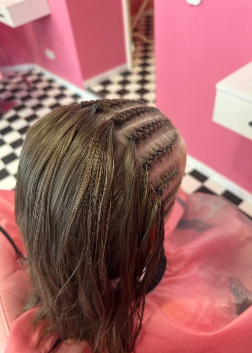 Frau mit Cornrows auf glattem Haar – Afro Shop Northeim.